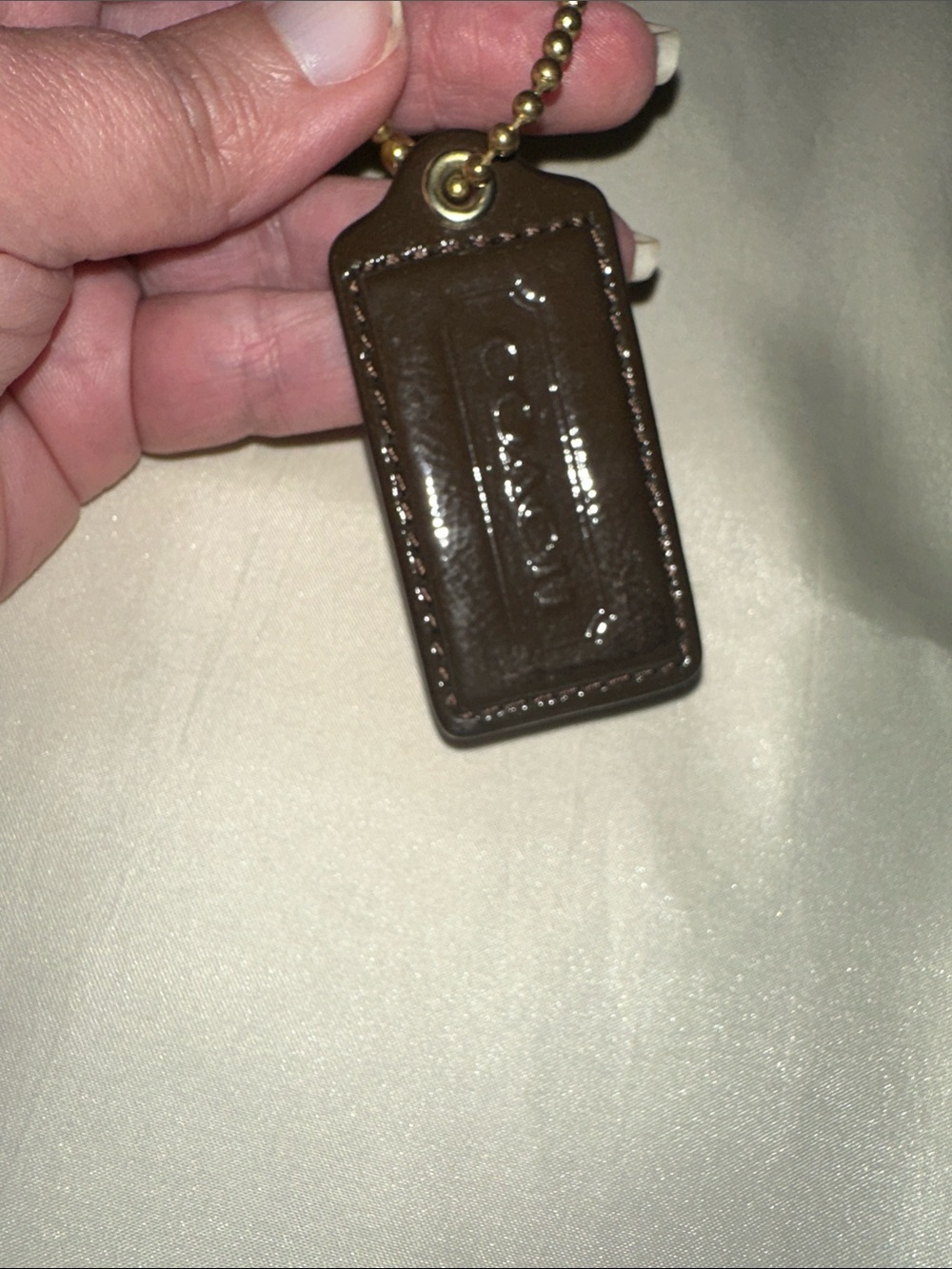 Coach Brown Leather Tag with Gold Ball Chain